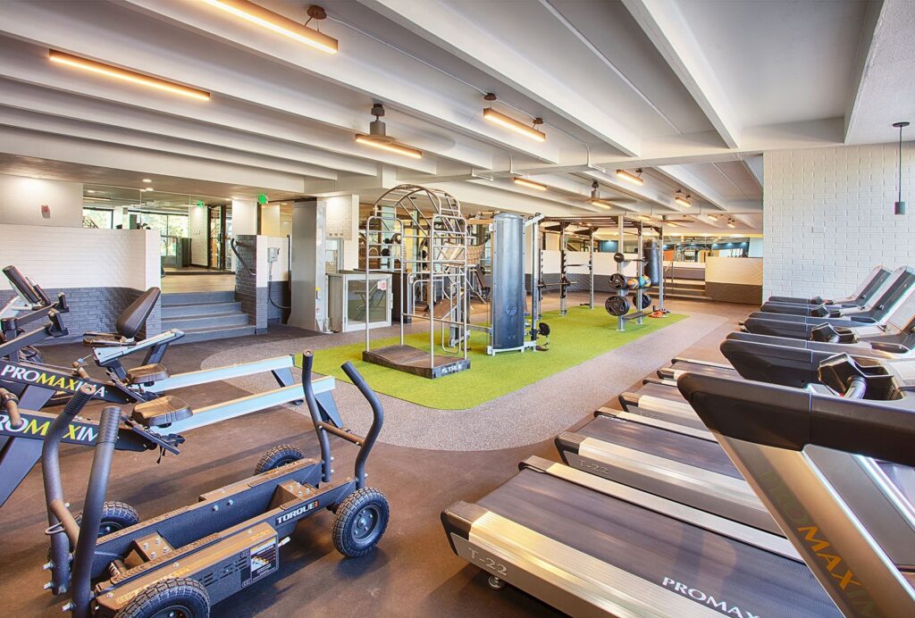 fitness center with cardio and strength training equipment